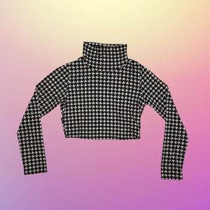 Black and white patterned long sleeve turtleneck crop top